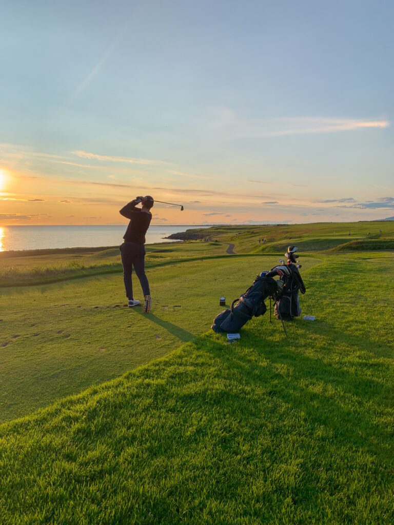 Evening golf in Iceland with golf bags